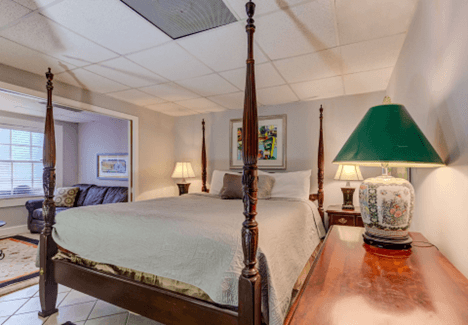 Large King size bed, dresser with oriental lamp