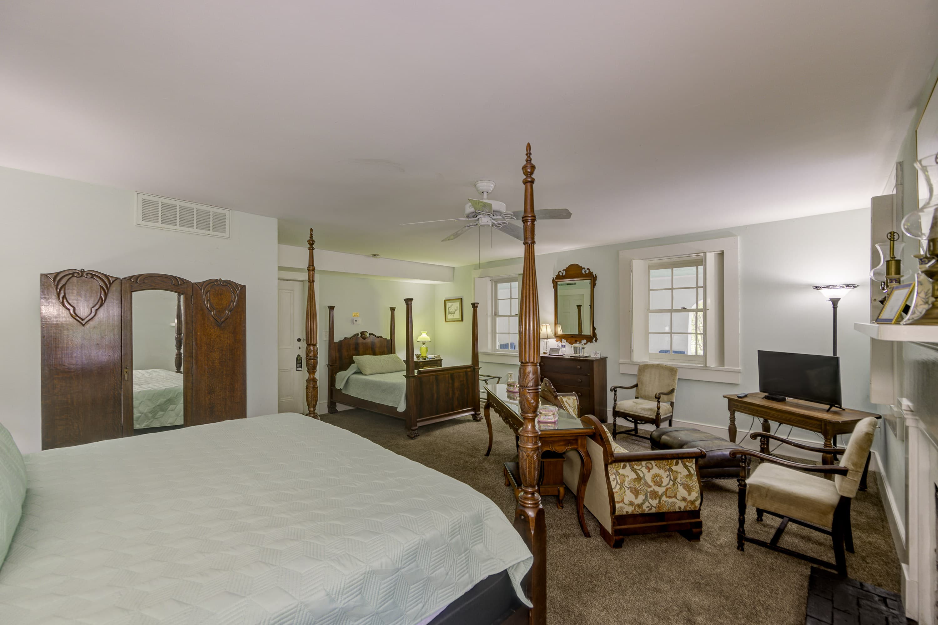 sitting area around the tv and fireplace