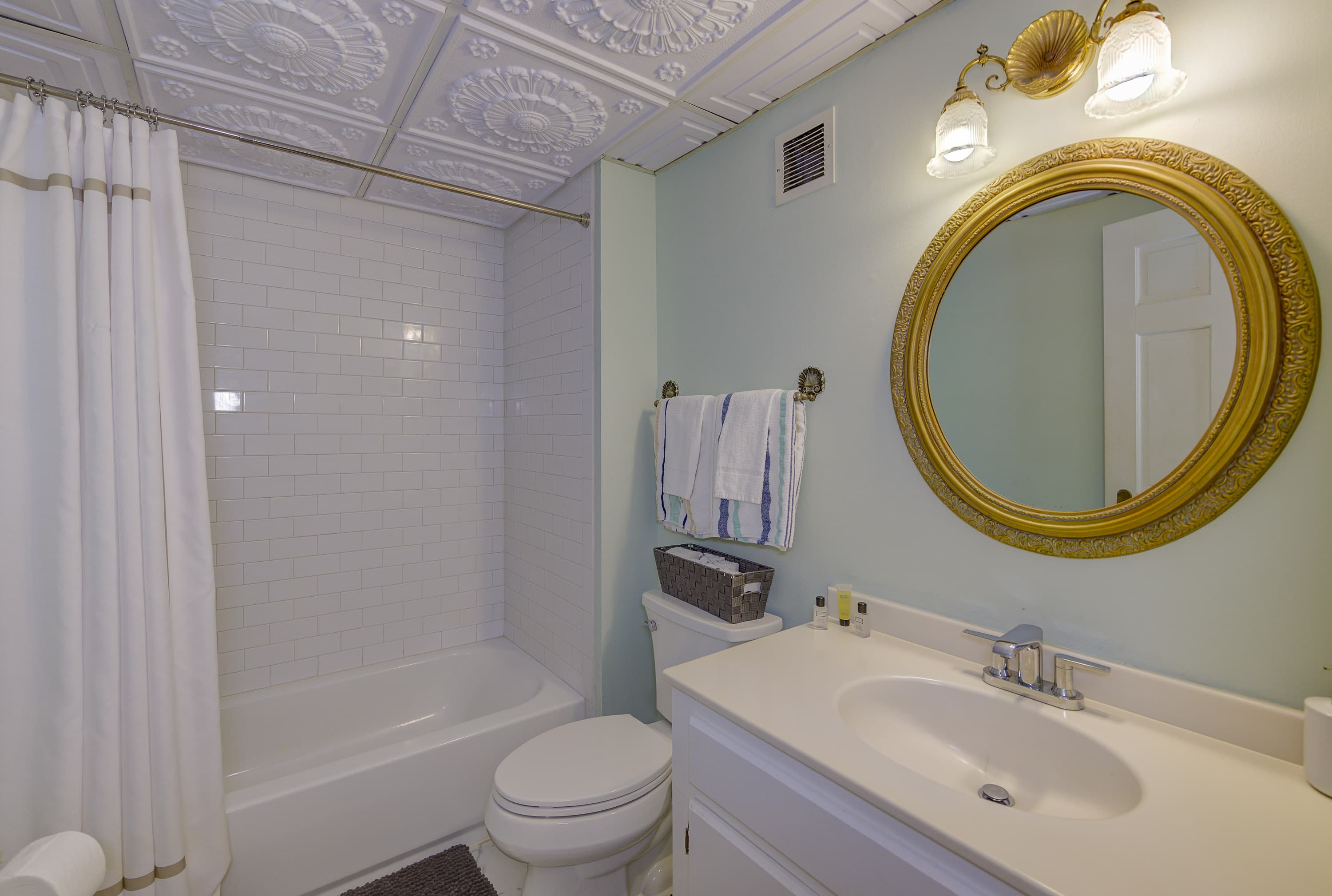 recently remodeled all white bath with tub/shower