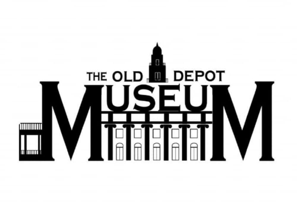Logo of The Old Depot Museum featuring stylized text and an architectural design.